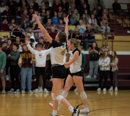 Kathryn Blake celebrates a point scored at the Hilltop during her high school career